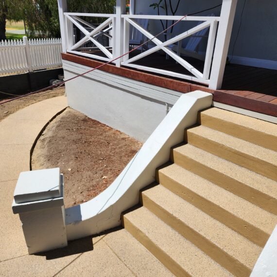 Decorative concrete patio in a residential backyard