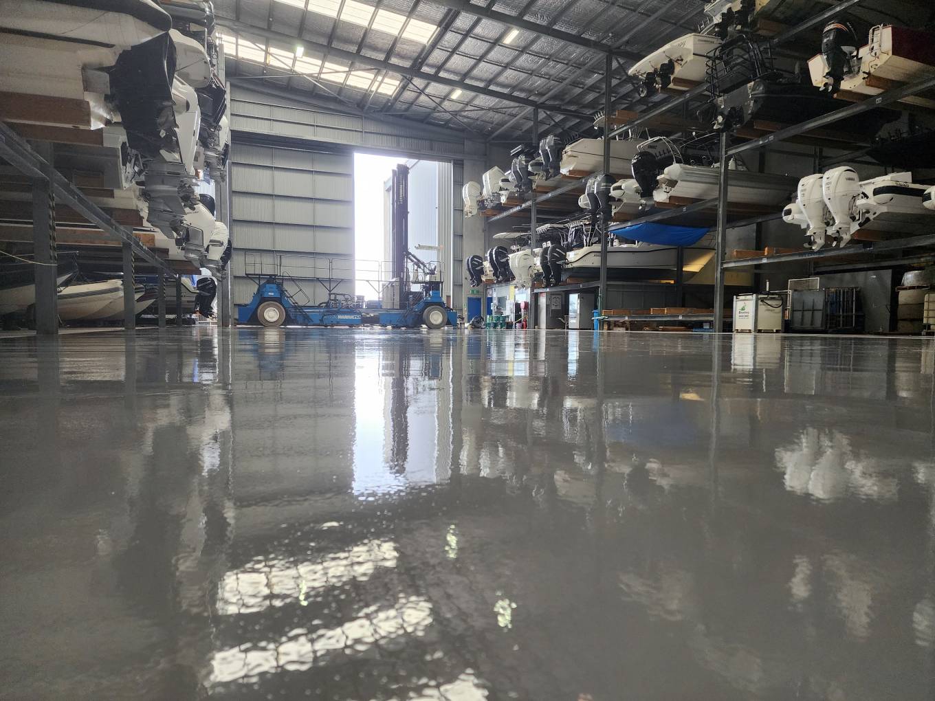 Epoxy floor coating applied to an industrial warehouse