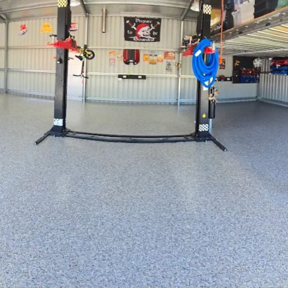 Epoxy floor coating applied in a garage